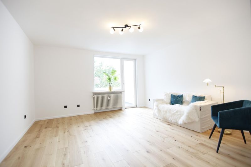 MODERNE 2-ZIMMER-WOHNUNG MIT BALKON + GARAGE